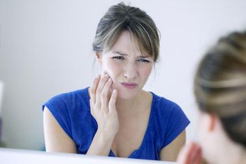 girl with root canal pain in Jacksonville, FL