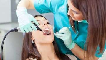 woman during teeth cleaning in jacksonville fl
